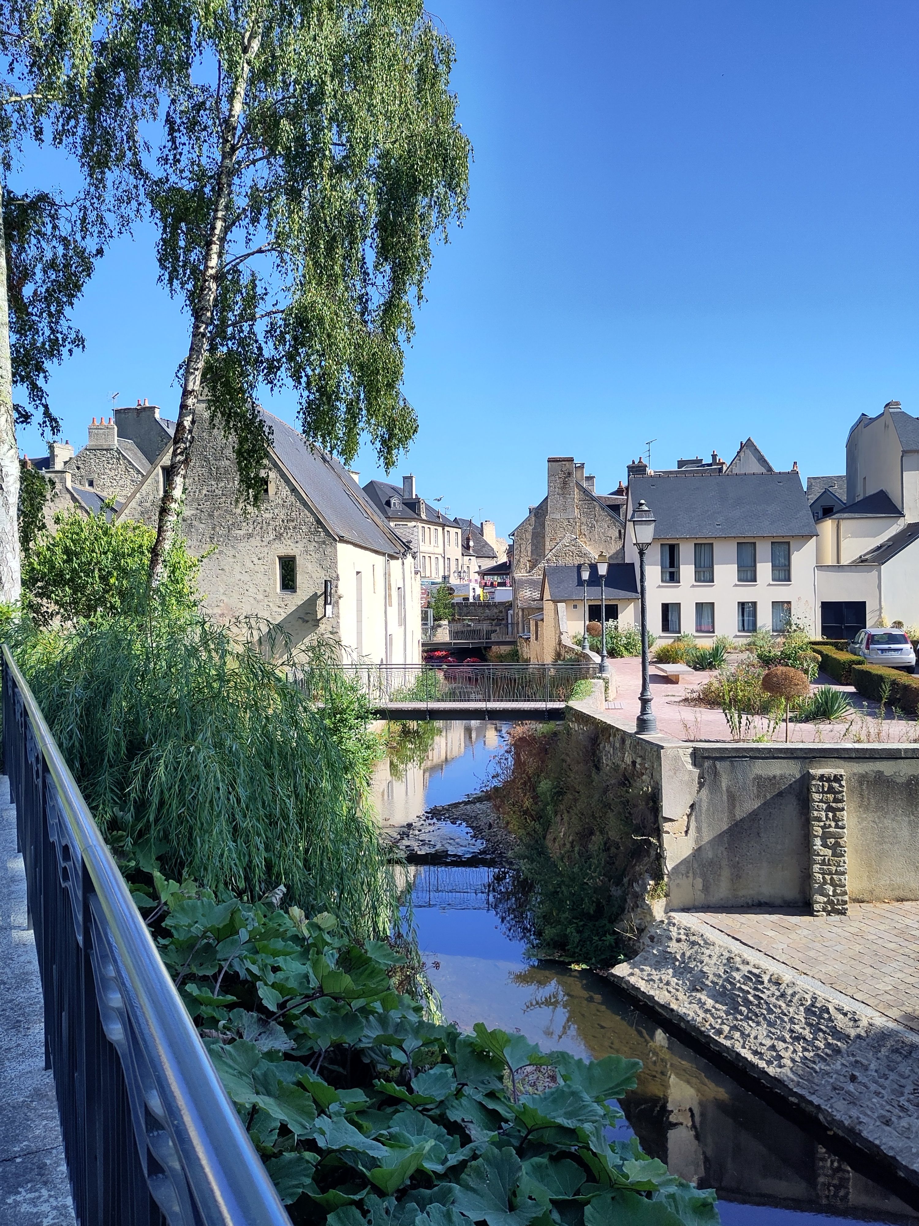 Creek by traditional buildings