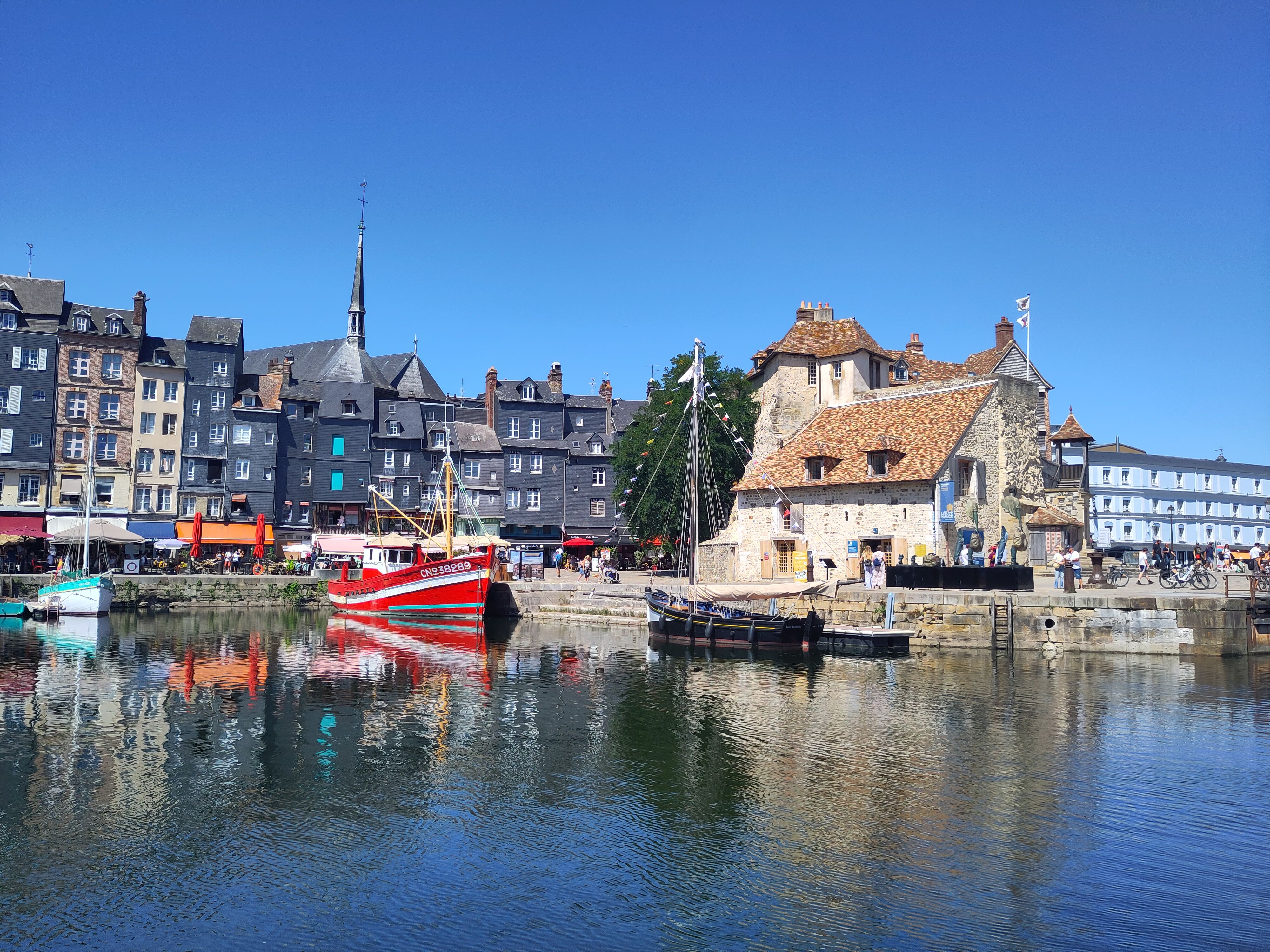 The harbor with traditional building an wood fishing vessel.